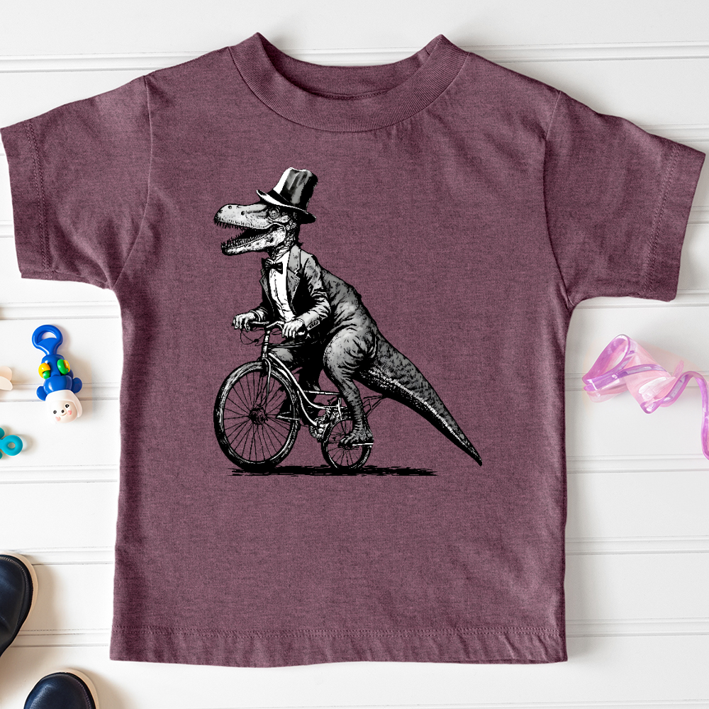 Dinosaur Riding a Bike Toddler Tee