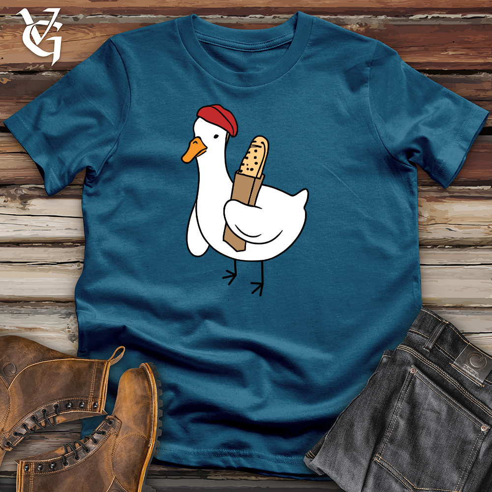 Viking Goods A Red Hat Wearing Duck Holding a Baguette Cotton Tee Deep Teal / L