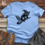 Raccoon Flying Broomstick Softstyle Tee