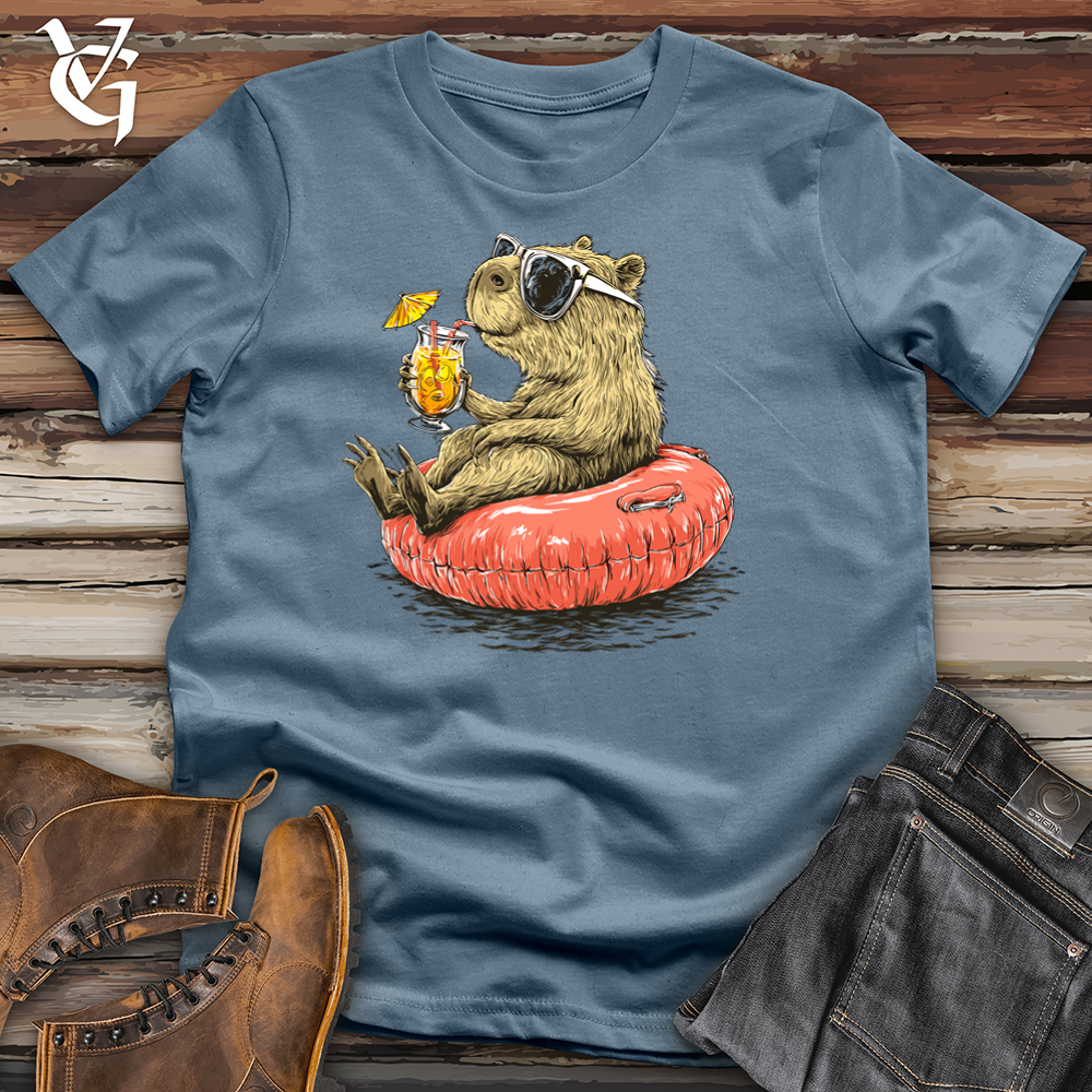 Viking Goods Capybara Lounging Poolside Softstyle Tee Indigo Blue / S