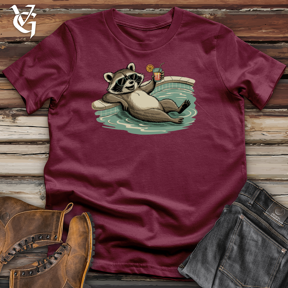 Viking Goods A Relaxed Raccoon on Swimming Pool Tee Maroon / L