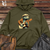 Melodic Reptile Strums Midweight Hooded Sweatshirt