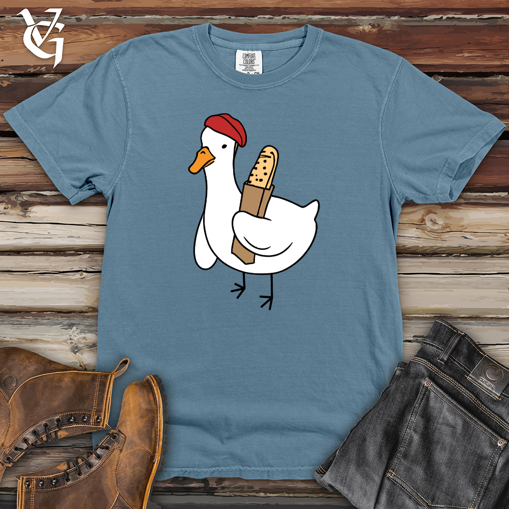 A Red Hat Wearing Duck Holding a Baguette Heavy Cotton Comfort Colors Tee