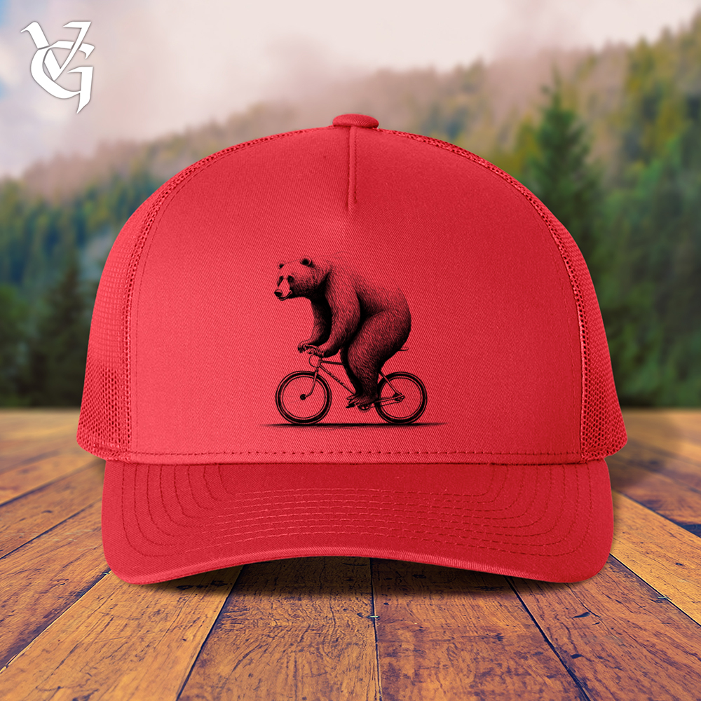 Bear Riding Bike Trucker Cap Pedaling in Style Viking Goods Company