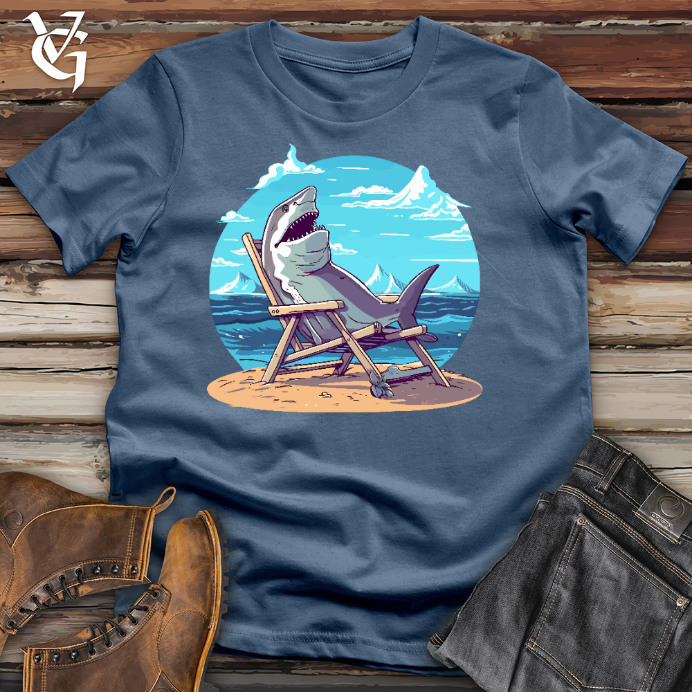 Shark Sitting in a Beach Chair in the Sand Cotton Tee