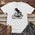 Cow Riding a Bike Heavy Cotton Comfort Colors Tee