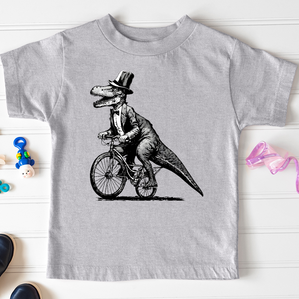 Viking Goods Dinosaur Riding a Bike Toddler Tee Athletic Heather / 2T