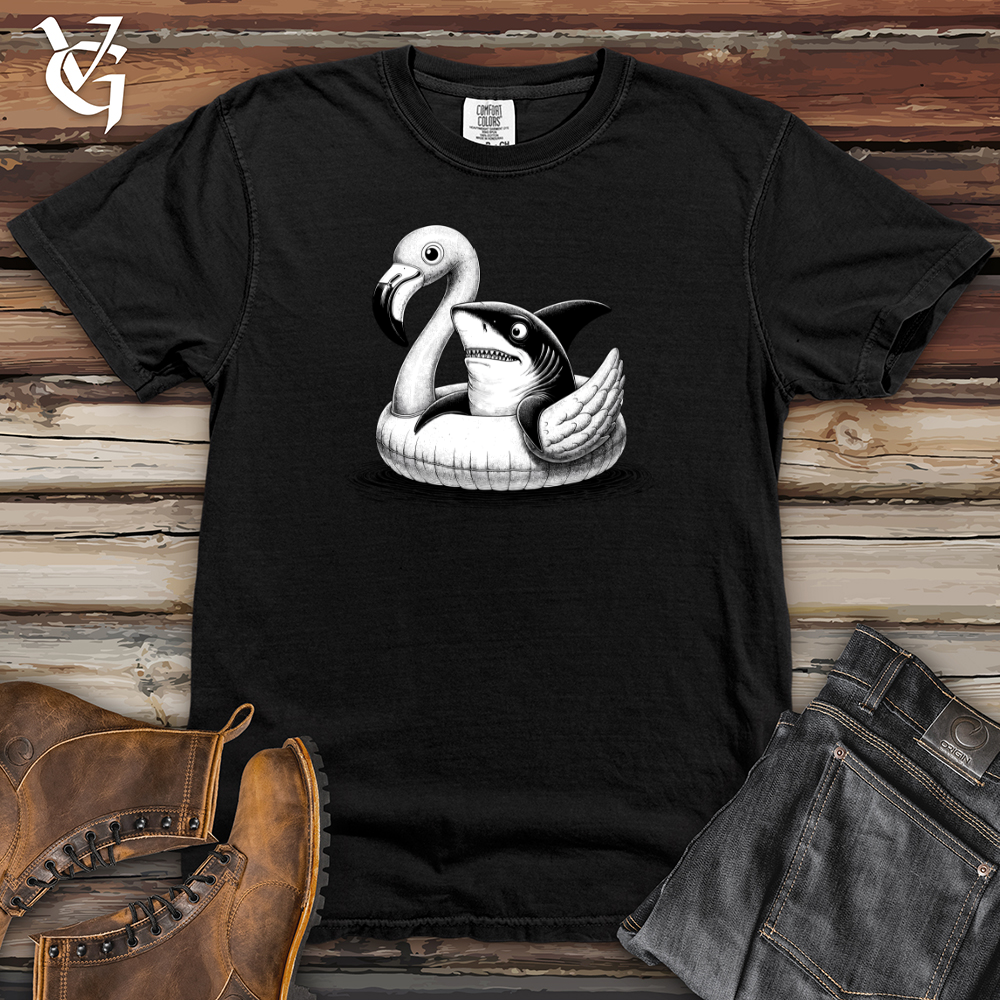 Viking Goods A Shark laying on top of a Flamingo Heavy Cotton Comfort Colors Tee Black / L