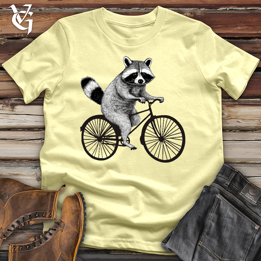 Viking Goods Raccoon on a Bike Softstyle Tee Cornsilk / L