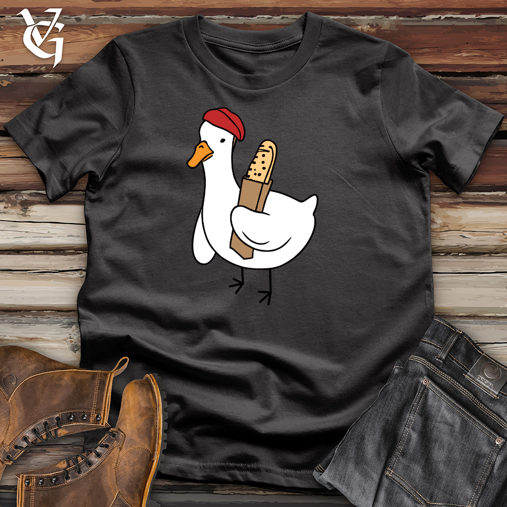 Viking Goods A Red Hat Wearing Duck Holding a Baguette Cotton Tee Dark Grey / L