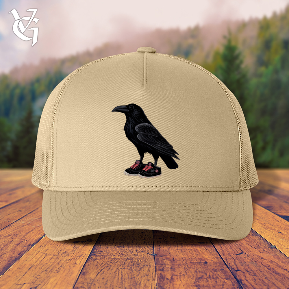 Viking Goods Raven Wearing Sneakers Trucker Cap Khaki