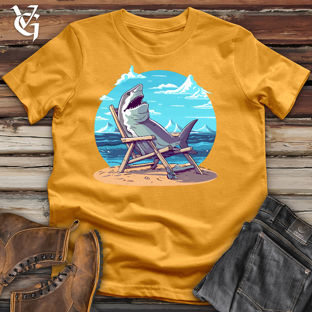 Viking Goods Shark Sitting in a Beach Chair in the Sand Cotton Tee Mustard / L
